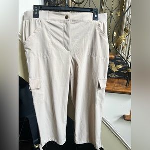 Chico’s Zenergy Crops.Tie hem bottoms.Snap button waist.Pockets.elastic waist.1